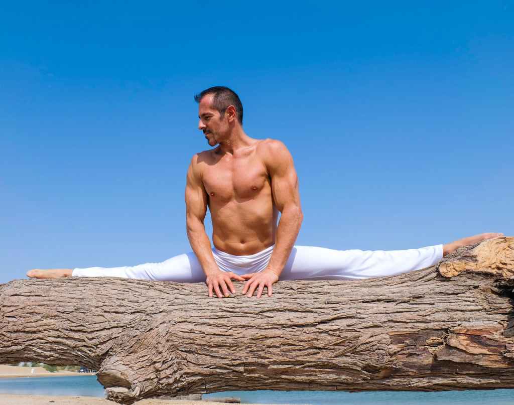 man doing middle split