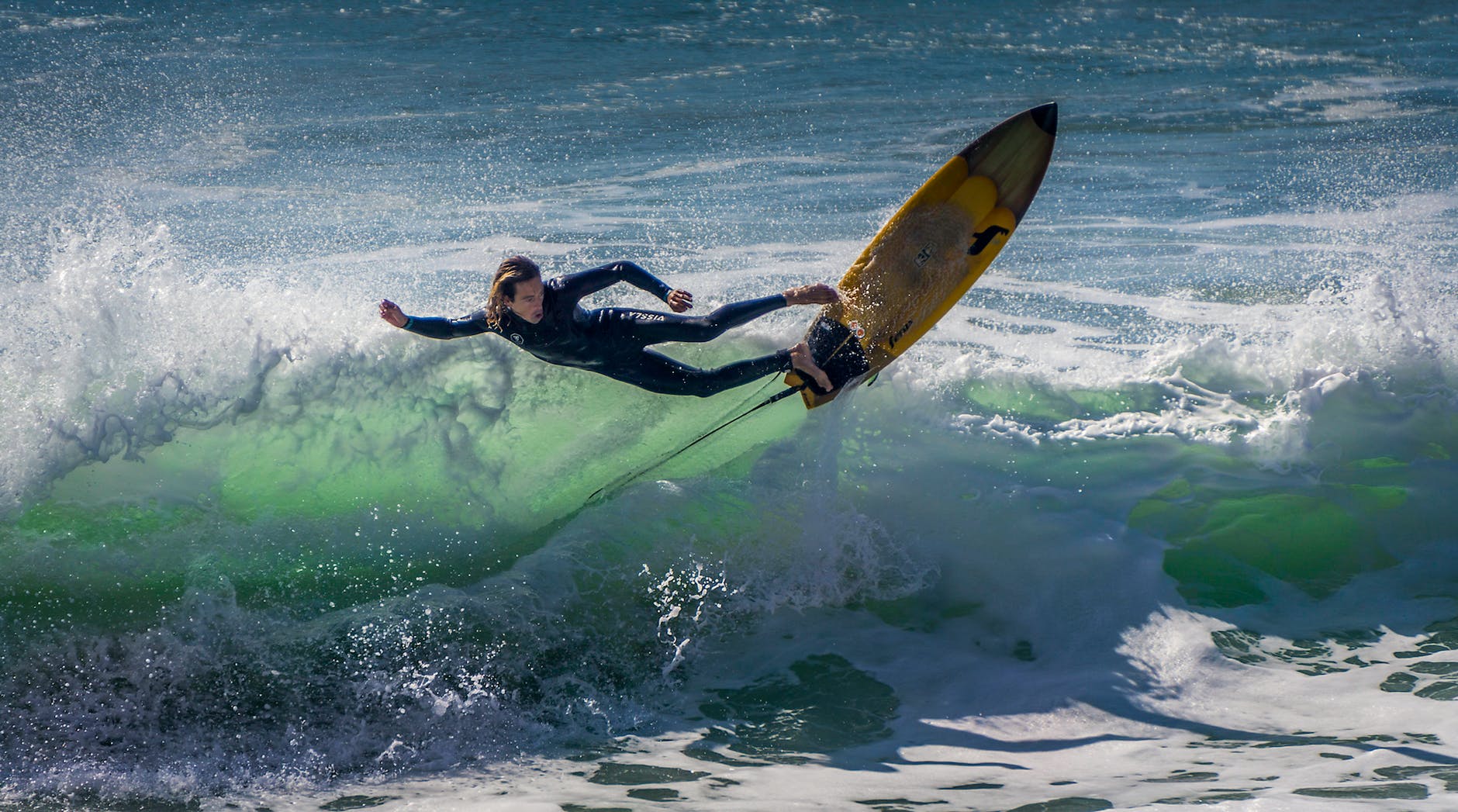 photograph of a person surfing